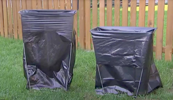 Bag Buddy Bag Holders - Home Pack set up outside on a grass yard
