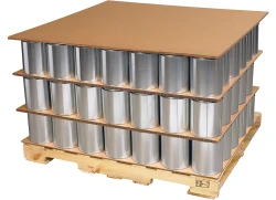 Corrugated Sheets Corrugated Cardboard Sheets Stacked Between Metal Cans on Pallet