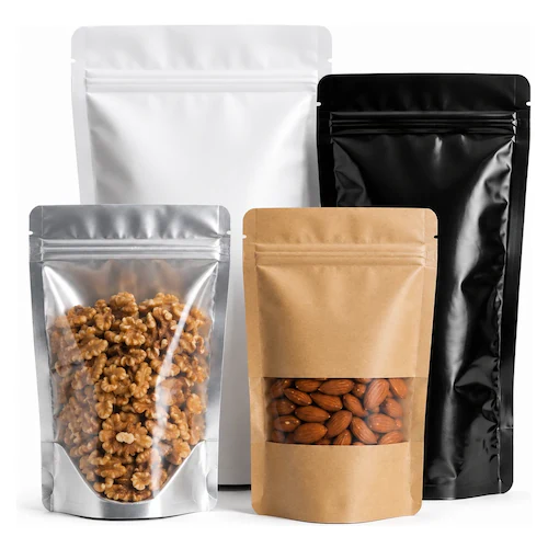 Stand-Up Pouches Four stand-up pouches in white, silver, kraft, and black holding coffee, nuts, and dried goods.