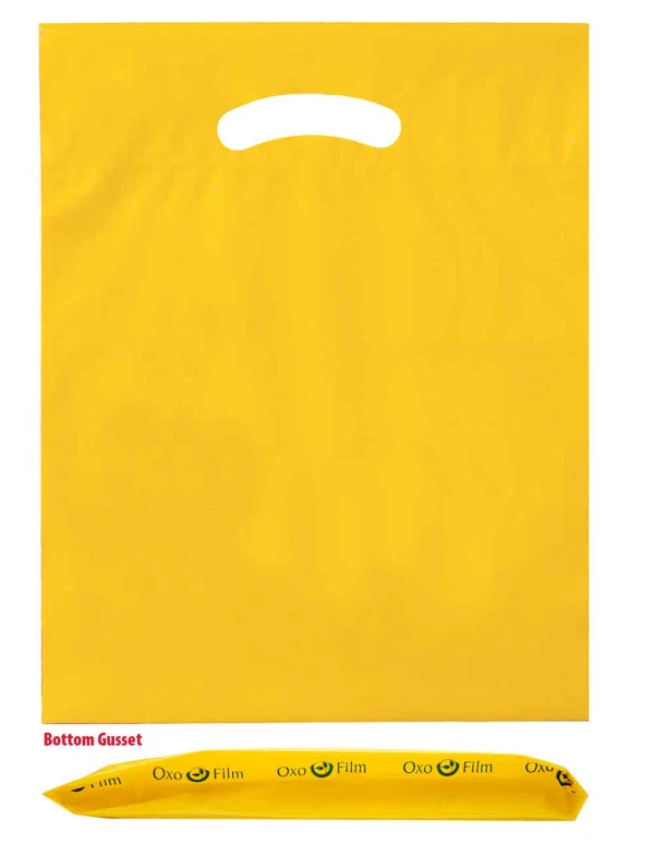 15 x 18 x 3 bottom gusset yellow die cut handle bags